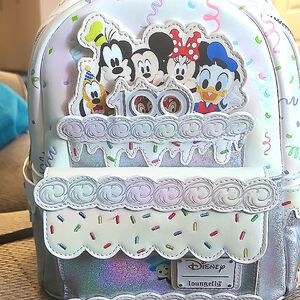 New! Never Used. LOUNGEFLY 100th Disneyland Backpack Confetti